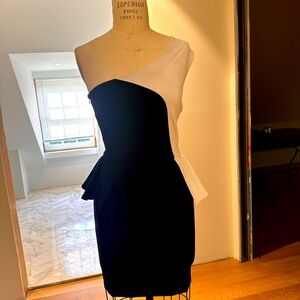 White and black peplum dress